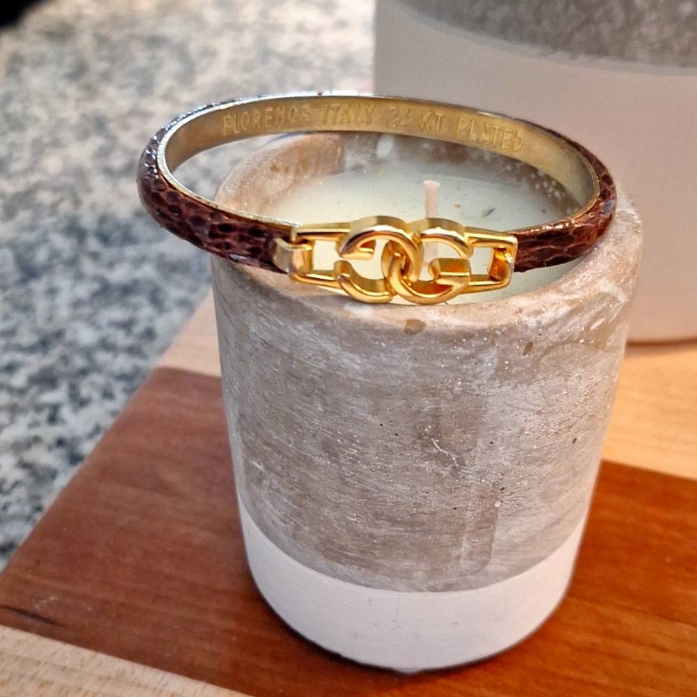 Gucci "GG" interlocking bracelet. Snakeskin band